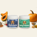 Two pet supplement jars labeled 'Multivitamin' and 'Daily Probiotic' with fruits and vegetables on a light background.